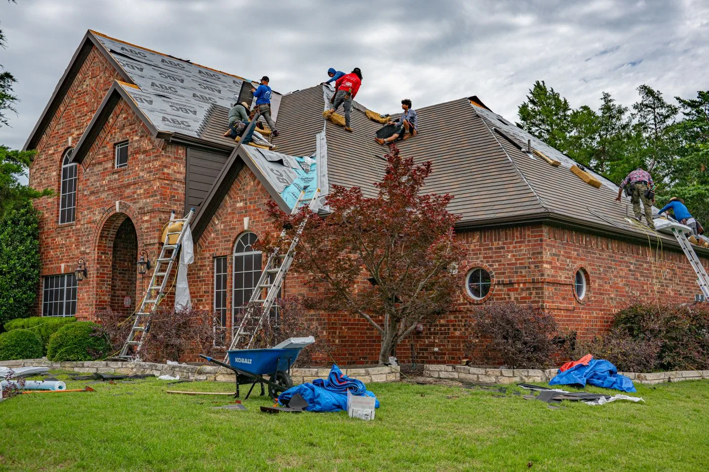 All Coast Roofing crew installing a new roof